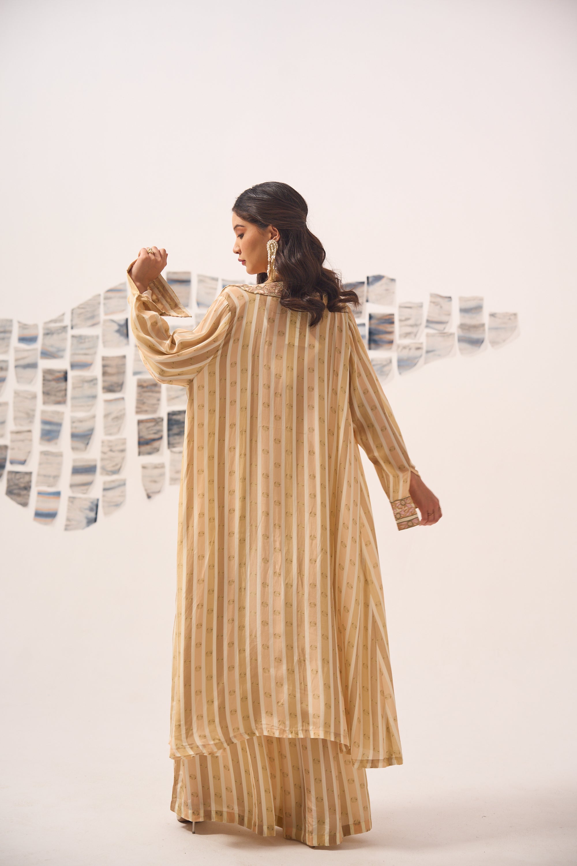 Beige Printed Sharara Set with Hand Embroidered Blouse and Cape