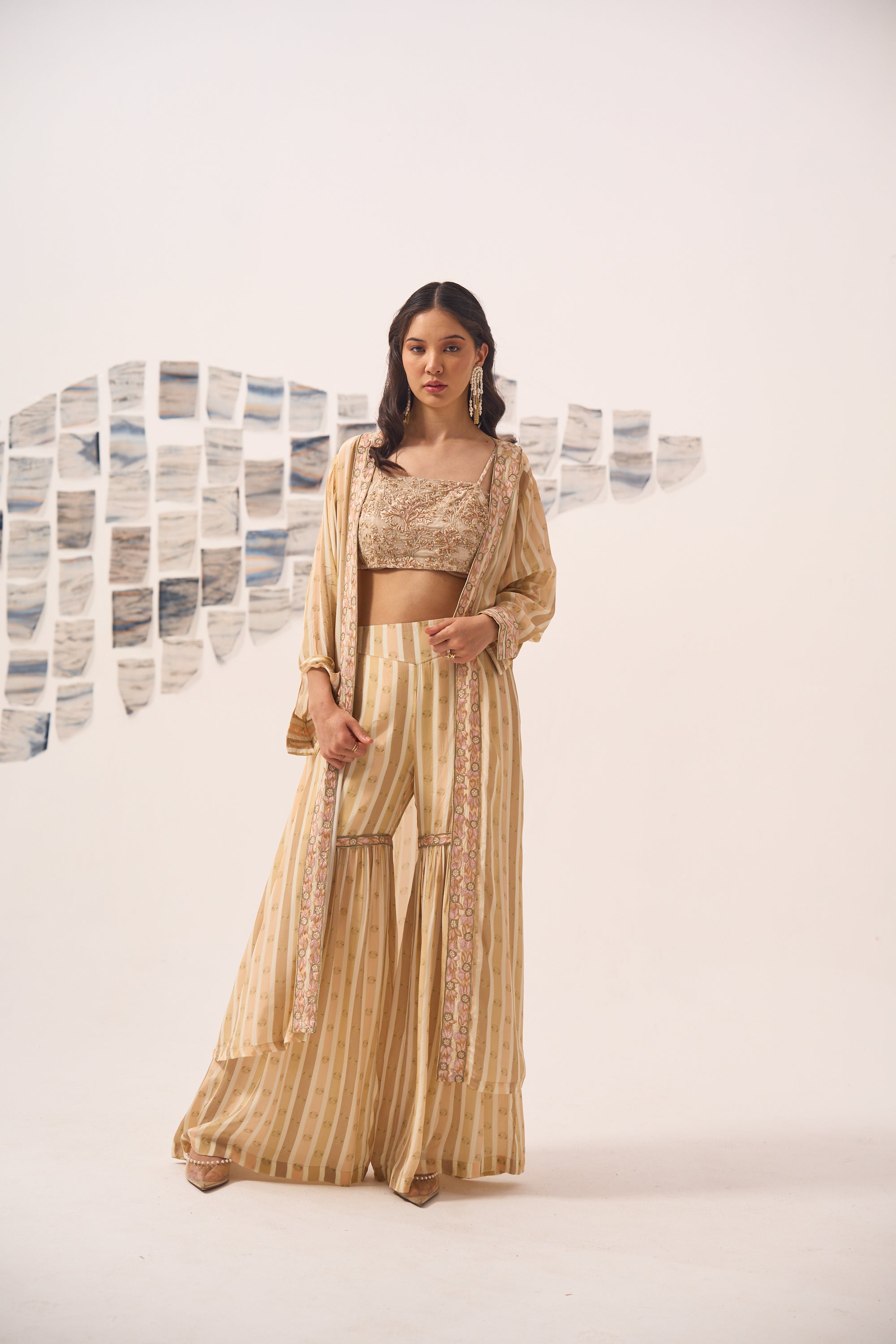 Beige Printed Sharara Set with Hand Embroidered Blouse and Cape
