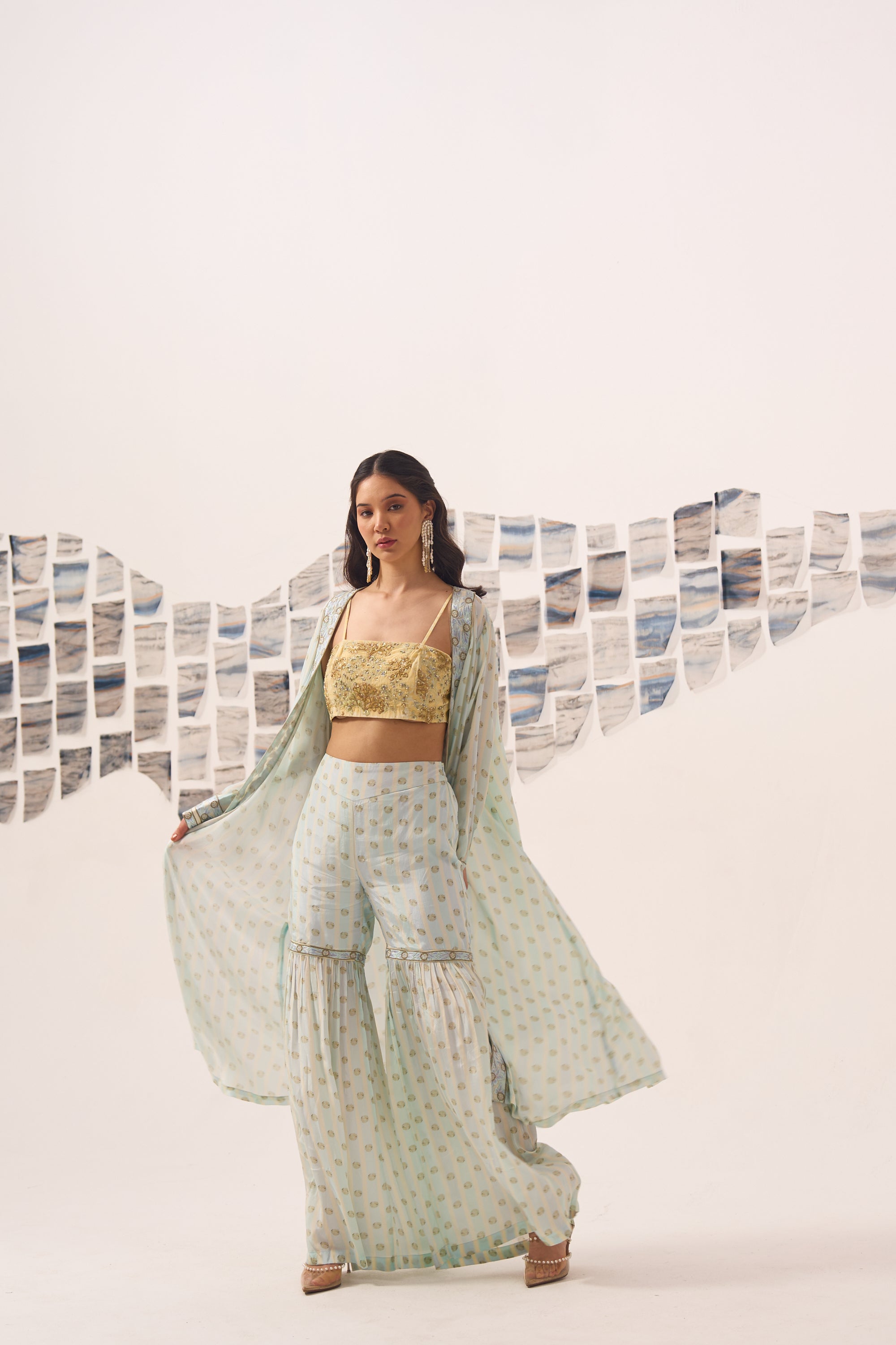 Blue Printed Sharara Set with Hand Embroidered Blouse and Cape